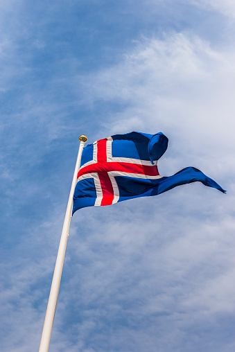 State and war flag and state and naval ensign used by the Icelandic Coast Guard, Iceland Air Defence System, Icelandic Crisis Response Unit. It's almost identical to the newer Icelandic flag but this has a lighter blue color, just like the normal flag. 