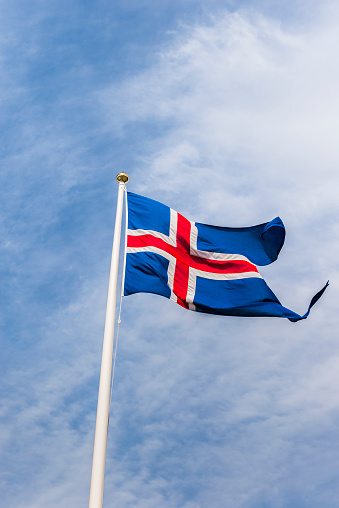 State and war flag and state and naval ensign used by the Icelandic Coast Guard, Iceland Air Defence System, Icelandic Crisis Response Unit. It's almost identical to the newer Icelandic flag but this has a lighter blue color, just like the normal flag. 