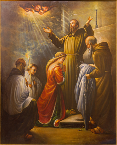 Cordoba - St. Francis of Assisi at the ordination of st. Clara in year 1212 in church Convento de Capuchinos. The paint from begin of 20. cent. by unknown artist.