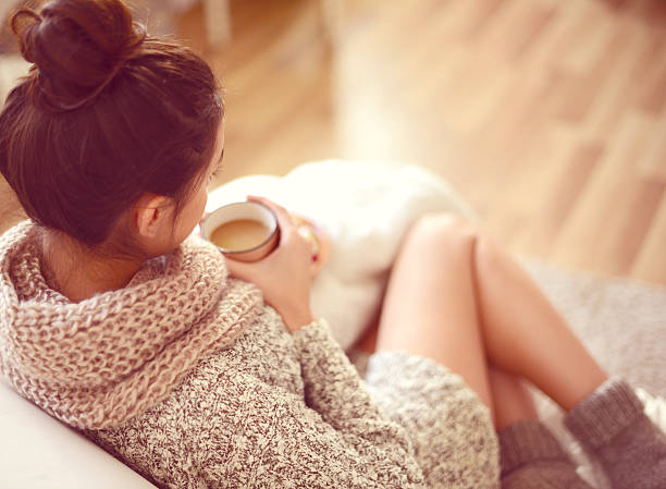 istock young beautiful woman drinking hot coffee 489629676