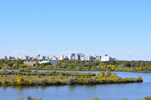 Panorama of downtown Regina, Saskatchewan, Canada with Wascana Lake in the foreground.