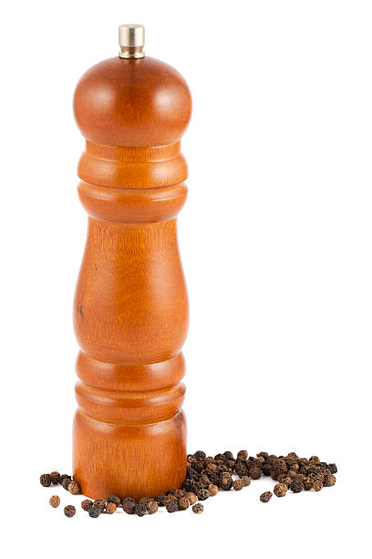 istock Wooden pepper mill and peppercorn 489630666