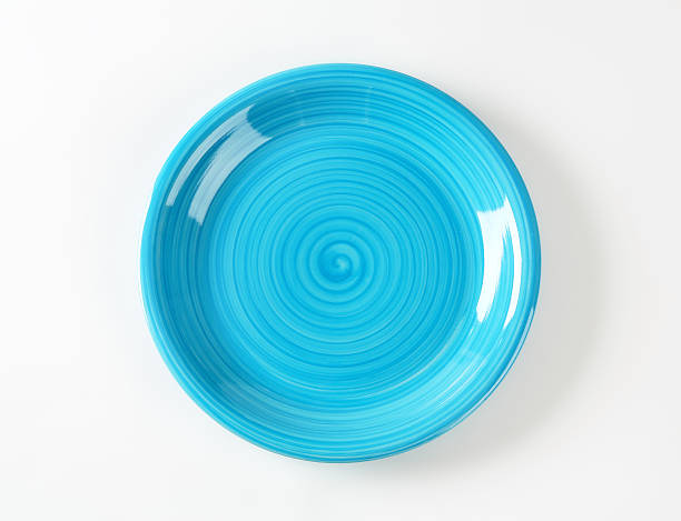 керамические пластины в форме coupe голубой - plate empty blue dishware стоковые фото и изображения
