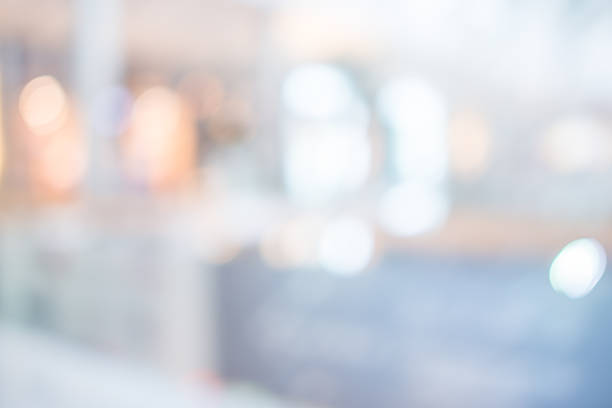 istock Store, shopping mall abstract defocused blurred background 489632104