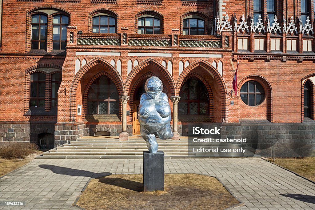 Sculpture of fat woman in Riga Riga, Latvia, March 09 2014: View of Willendorf Venus sculpture near Latvian Academy of Arts at spring time 2015 Stock Photo