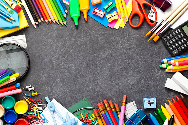 istock School supplies border on black chalkboard 489635726