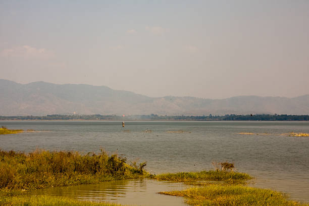 istock natural landscape water lake and behind mountain 489636774