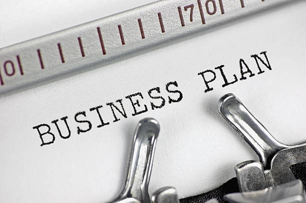 istock Typewriter detailed macro closeup typing text Business Plan, success metaphor 489637242