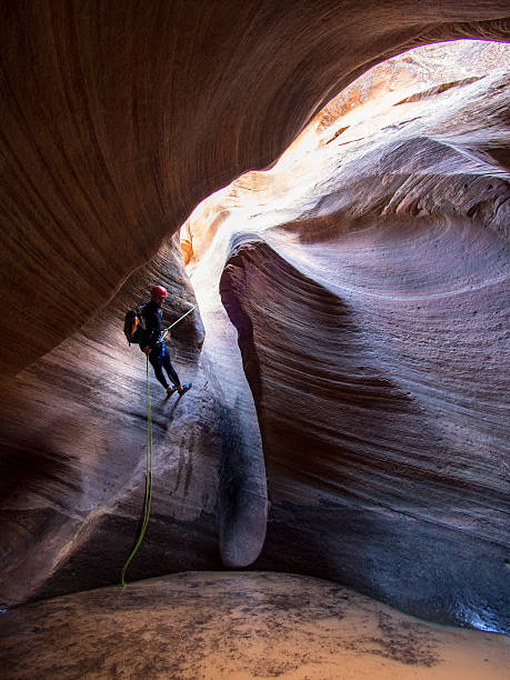 istock Canyoneer Rappels in a Slot Canyon 489643483