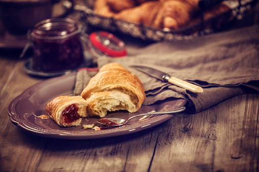 Croissants for breakfast with jam