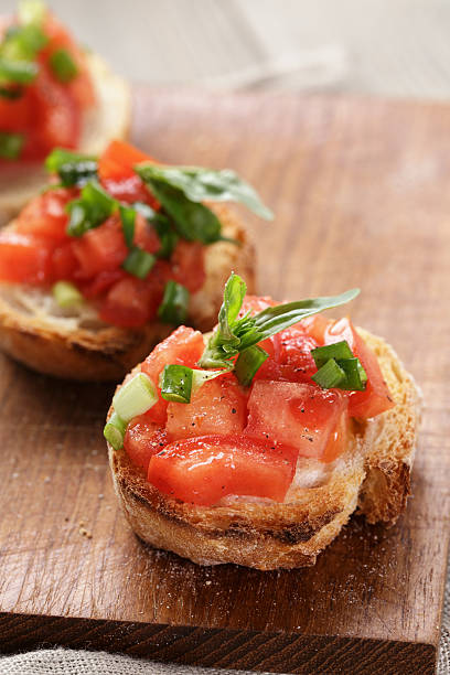 istock simple italian appetizing bruschetta with tomato 489649167
