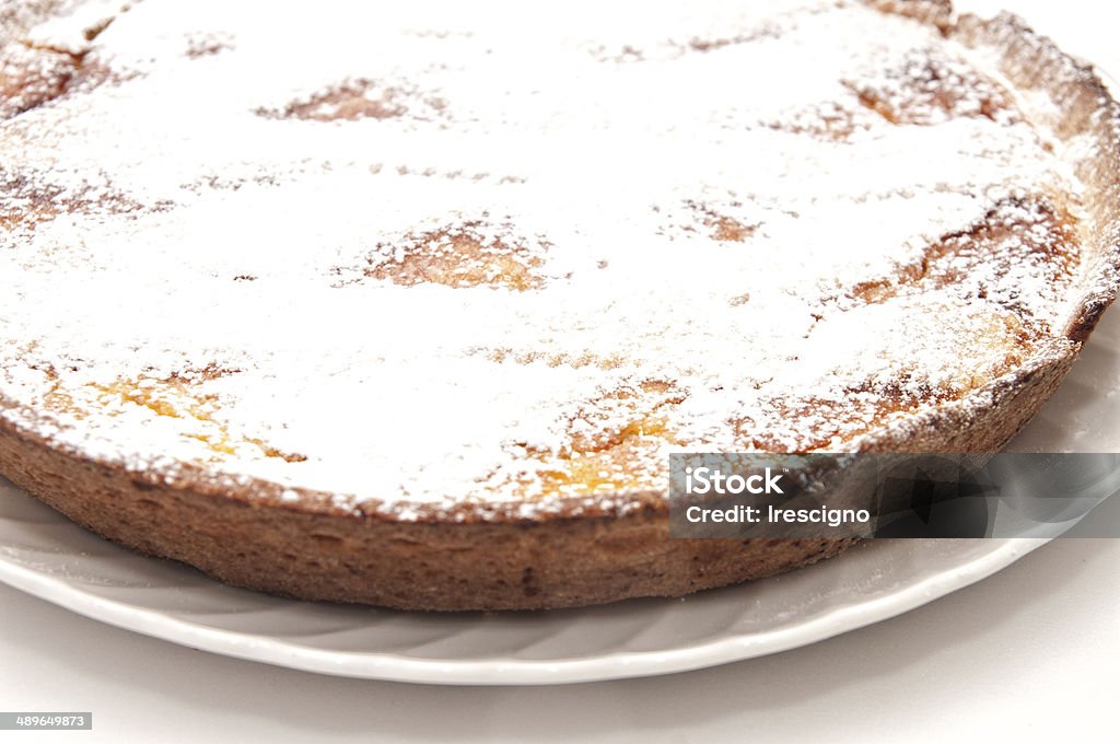 The pastiera, Neapolitan Easter Cake Cake of the traditional Neapolitan Easter festivities consisting of a sheet of puff pastry with ricotta cheese, custard, corn, milk, eggs, ricotta cheese, candied fruit. Baked Stock Photo