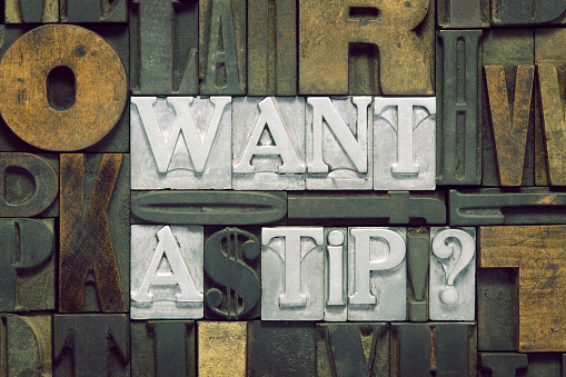 want a tip question made from metallic letterpress blocks in mixed wooden letters