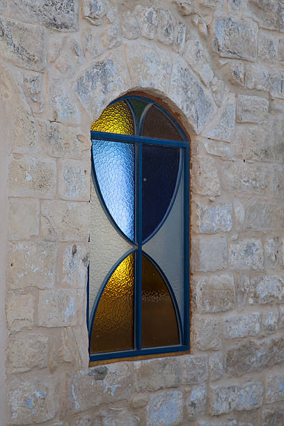 istock Colored window of synagogue in Zefat (Safed) Israel 489663738