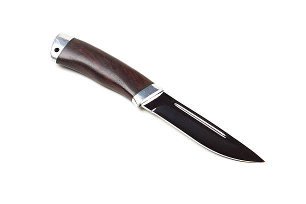 istock hunting knife with wooden handle, isolated 489664404