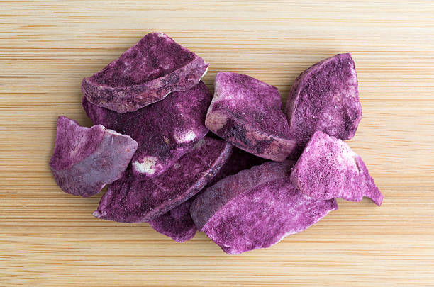 istock Maqui powdered freeze dried apple slices on cutting board 489667440