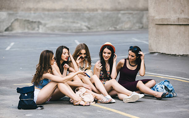 istock Five beautiful young girls relaxing 489668542