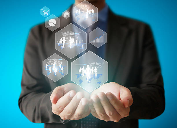istock Holding virtual icon of social network in hand 489668654