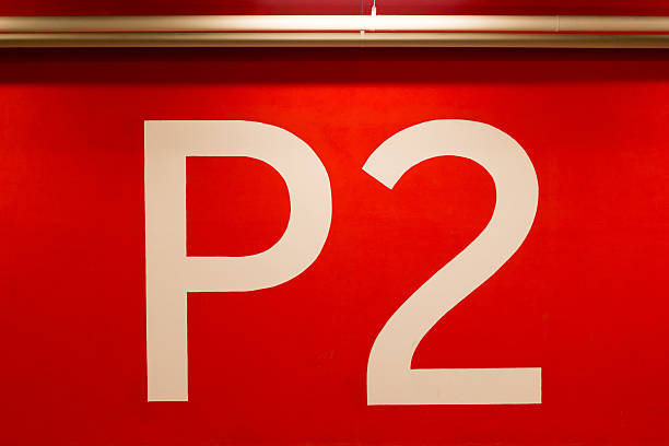 istock P2 huge sign painted on the red wall 489668766