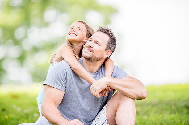 istock Father and Daughter Enjoying a Day in Nature 489669836