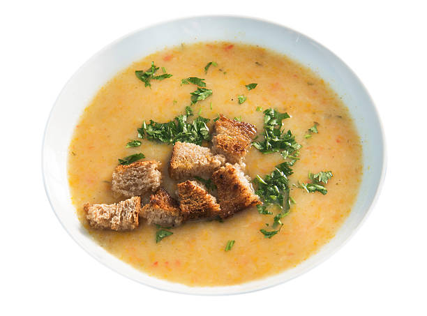 istock Squash soup in a bowl, isolated on a white background. 489673324