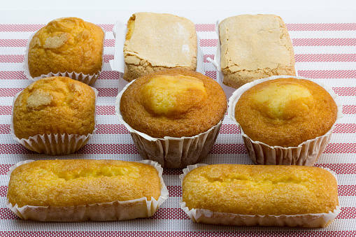 Sweet based on flour, eggs and butter for breakfast or snack. In the photo different types, round, square, elongated, etc.