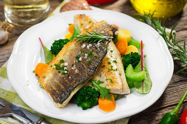istock Sea bass fillet with vegetables 489688520