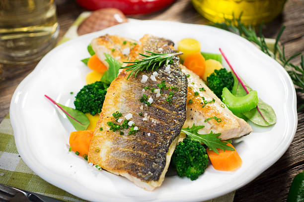 istock Sea bass fillet with vegetables 489688590