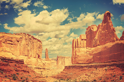 Old postcard from Wild West, retro toned photo of Arches National Park, Utah, USA.