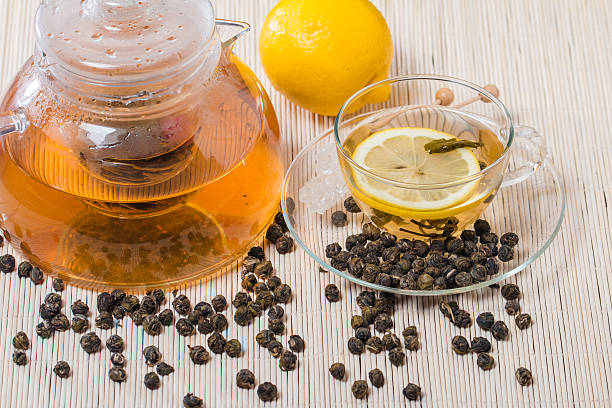 istock Cup of green tea with 489690988