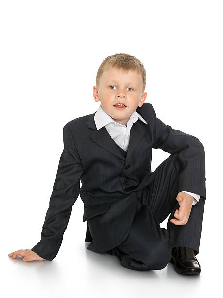 istock little boy in a suit 489691206