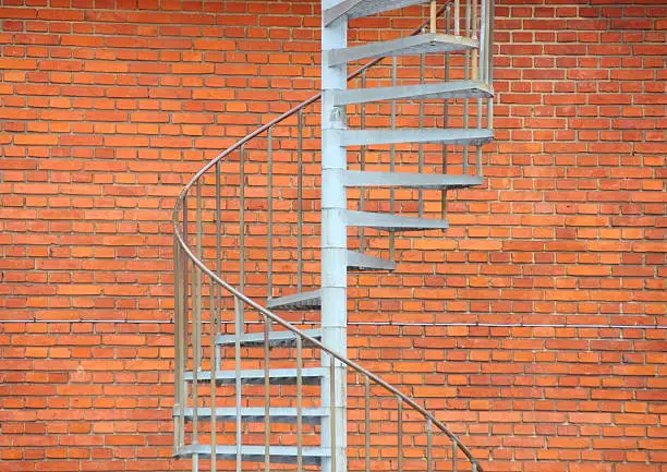 Metal staircase outside building as fireescape