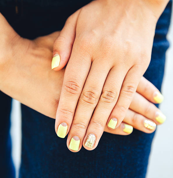 istock Female hand with stylish colorful nails 489694052