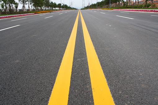 Double Yellow Line On Asphalt Road