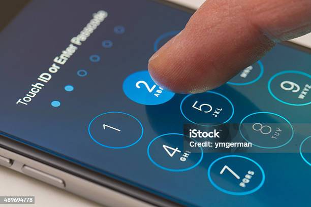 Enter Passcode Screen Of An Iphone Running Ios 9 Stock Photo - Download Image Now - Unlocking, Password, Protection