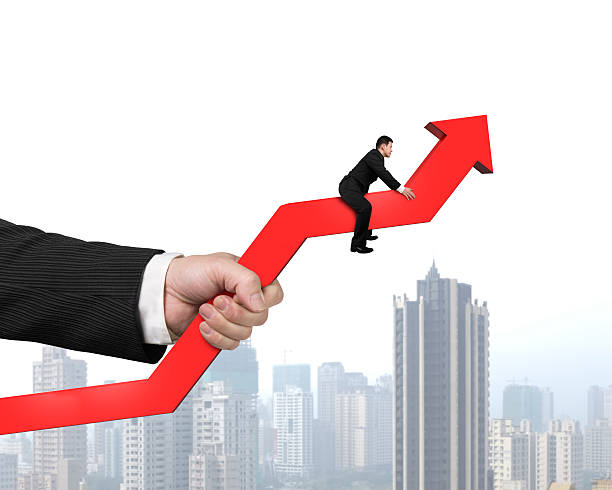 istock Holding red arrow with hand sitting 489695625