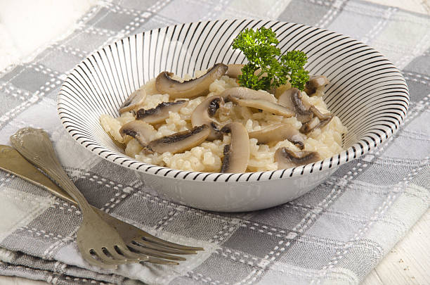 istock risotto rice with cooked mushroom 489695771