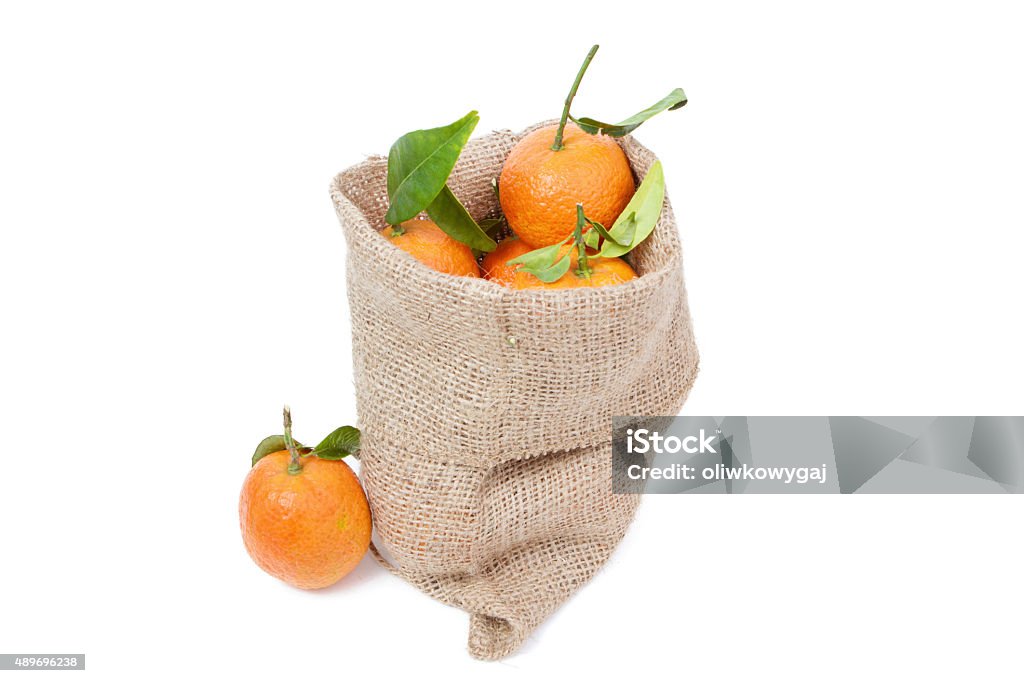 The mandarins in the sack the mandarins in the sack isolated on white 2015 Stock Photo