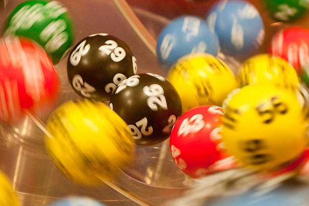Tumbling bingo balls stock photo