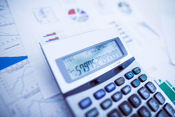 Calculator on a desk stock photo