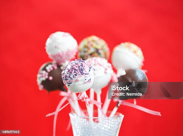 Brownie Cakepops Over Red Background Stock Photo - Download Image Now - Cake, Cake Pop, Candy