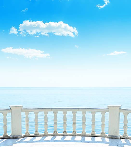 istock balcony near sea and blue sky with clouds 489698862
