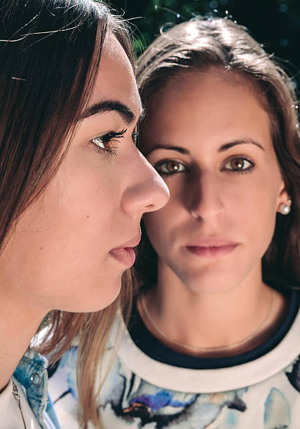 istock Two serious women with focus on profile woman 489699728