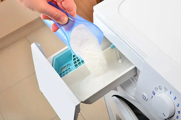 Photo of Pouring washing powder