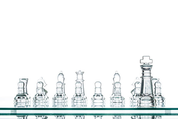 istock leader Standing Out From The Crowd, glass Chess 489701486