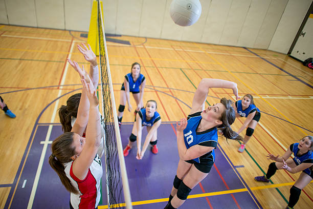 istock Mid Air Volleyball Action Shot 489701516