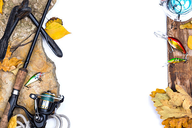 istock fishing tackles on stones with anchor and leafs 489723146