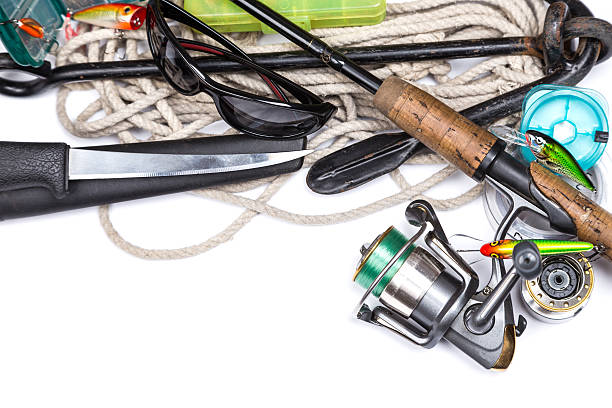 istock fishing tackles and anchor with cord on white 489723732