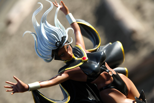 Vancouver, Canada - September 22, 2015: A model of the X-Men character Storm against the English Bay landscape in Vancouver. The model is from the Bishoujo collection from Kotobukiya