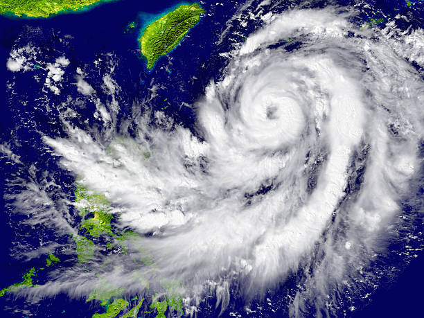 hurricane approaching southeast asia - tyfoon stockfoto's en -beelden